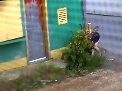 fuckin crazy crackhead in he alley gets naked